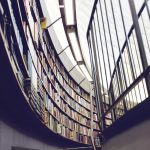 Books in a curved space with lighting